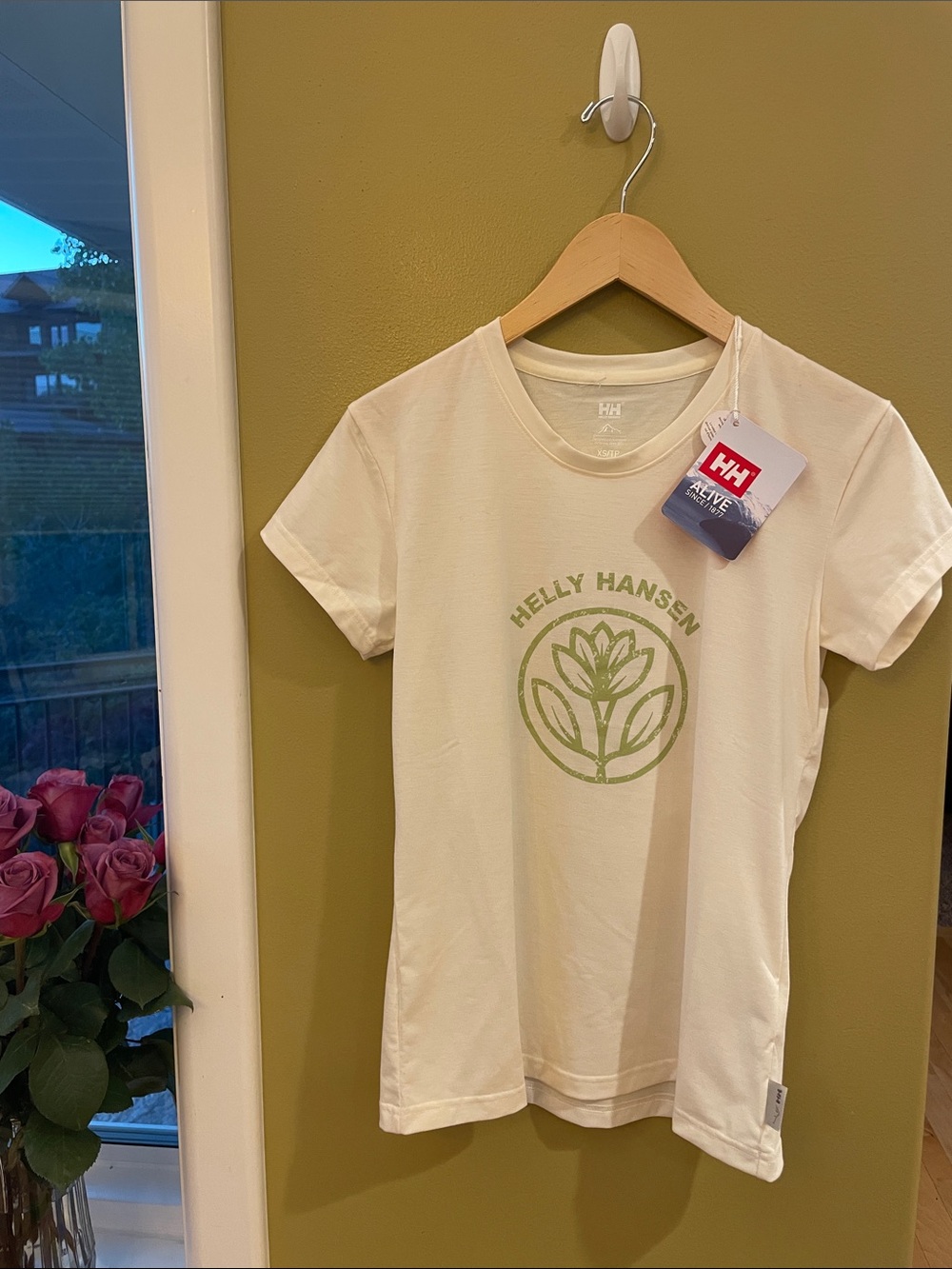 NWT Helly Hansen Cream Tee with Green Floral Logo